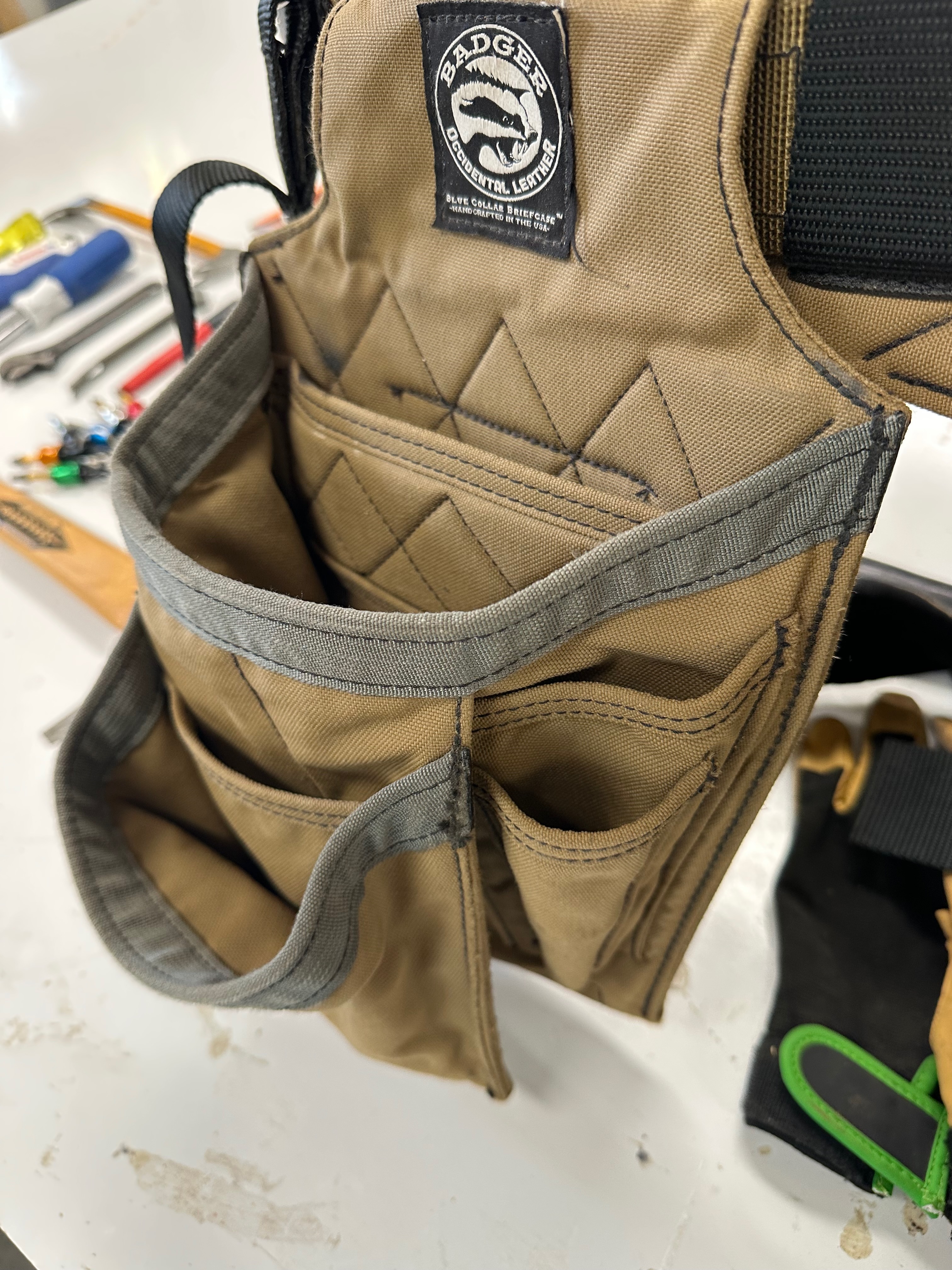 Empty Badger B12 pouch standing open and retaining the shape of its compartments.